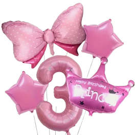 Pink birthday balloons shaped like bows, stars, and numbers