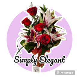 Bouquet of red roses and pink lilies with a ribbon