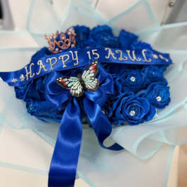 Blue rose bouquet with a satin ribbon and butterfly decoration