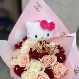 Bouquet of red, blush, and white roses with a Hello Kitty plush topper