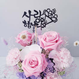 Pink rose and carnation bouquet with a Korean topper