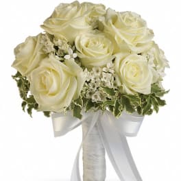 White rose bouquet with ribbon-wrapped stems