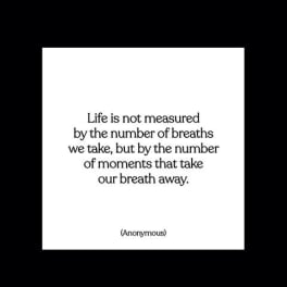 White quote card with black text on a black background