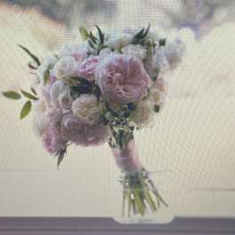 Pink and white bouquet with roses and ruffled blooms