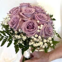 Bouquet of lavender roses with white baby's breath