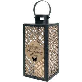 Decorative black lantern with a lattice panel and memorial message