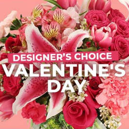 Pink and red mixed bouquet with lilies and roses, overlaid with Valentine's Day text