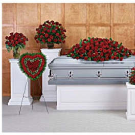 Red rose funeral casket spray with matching standing arrangements
