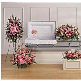 Pink floral funeral casket spray with matching standing arrangements