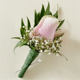 Pink calla lily boutonniere with baby's breath and greenery