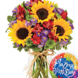 Bouquet of sunflowers, red alstroemeria, and purple asters with a birthday balloon