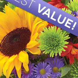 Bright mixed bouquet with sunflowers, purple daisies, and green mums