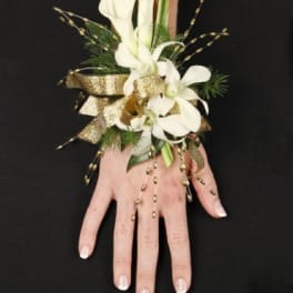 White calla lily wrist corsage with gold ribbon and bead accents