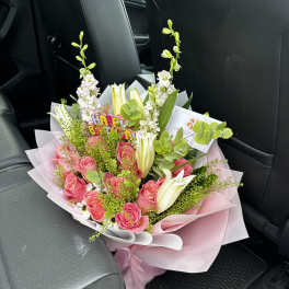 Pink rose bouquet with white lilies and a birthday topper