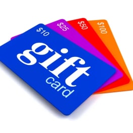 Stack of colorful gift cards with dollar amounts on a white background