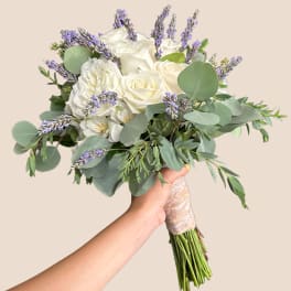 White rose bouquet with lavender sprigs and eucalyptus