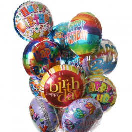 Cluster of colorful birthday balloons with printed messages
