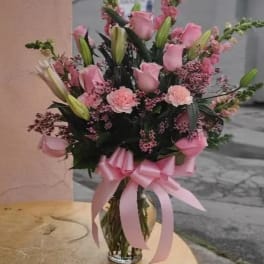 Blush roses & blush carnations.