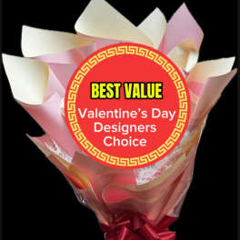 Wrapped bouquet with a Valentine’s Day label and red ribbon