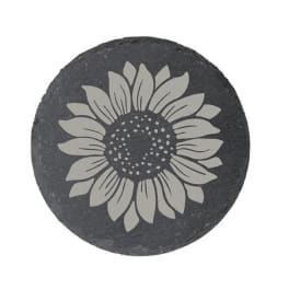Round black stone with a white sunflower design