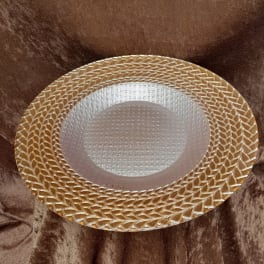 Gold decorative bowl with a textured silver interior