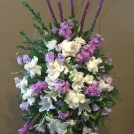 Tall standing floral spray with white and lavender flowers