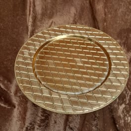 Gold decorative charger plate with a diamond pattern