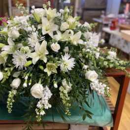 Heavenly Light Casket Spray