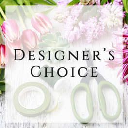 Designer’s Choice floral arrangement with pink and white blooms and green accents