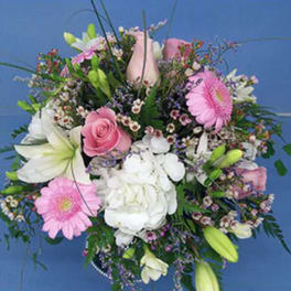 Mixed bouquet with pink gerberas, white lilies, and roses