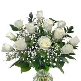 White rose bouquet in a clear glass vase
