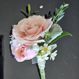 Light pink spray rose boutonniere
