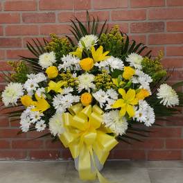 Yellow and white floor basket