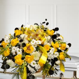 Yellow, white and black Casket