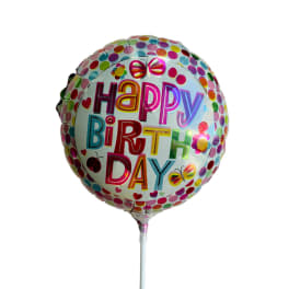Round birthday balloon with colorful polka dots and "Happy Birthday" text