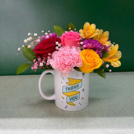 Mixed bouquet in a white mug with a thank-you design