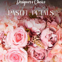 Pink roses and peonies in a pastel floral arrangement
