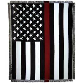 Black-and-white American flag blanket with a red stripe and fringe