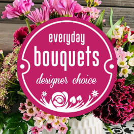 Pink mixed bouquet with a designer choice label