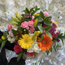 Colorful bouquet with gerbera daisies, roses, and carnations