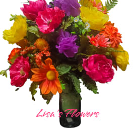 Bright mixed bouquet in a dark vase with pink, yellow, purple, and orange blooms
