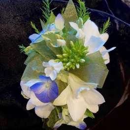 white corsage, with blue