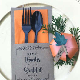 Thank-you gift set with a card, plastic cutlery, and a paper favor box