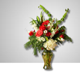 Red and white mixed bouquet in a glass vase