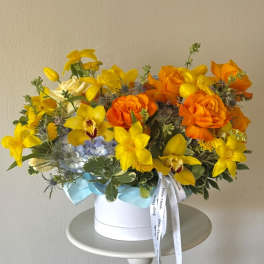 Sunshine Escape-Orchids, roses, hydrangeas,tulips(will be replaced when not in season)