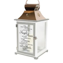 White memorial lantern with a printed sympathy message