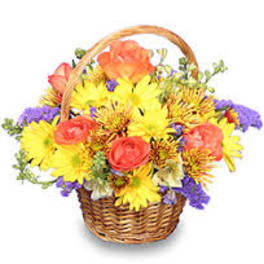 Basket of mixed yellow, orange, purple, and red flowers