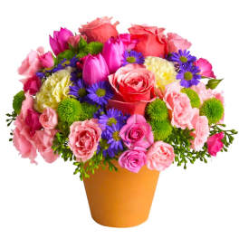 Mixed pink and purple bouquet in an orange pot