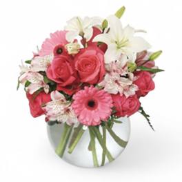 Pink and white mixed bouquet in a clear glass vase