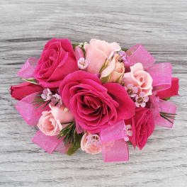 Pink and blush rose bouquet with pink ribbon accents